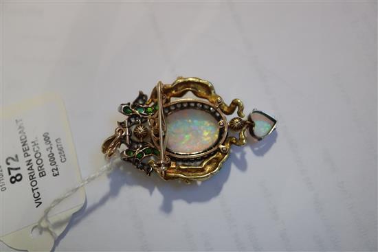 A good Victorian Renaissance revival gold and silver, white opal, green enamel, pearl diamond and garnet set drop pendant brooch,